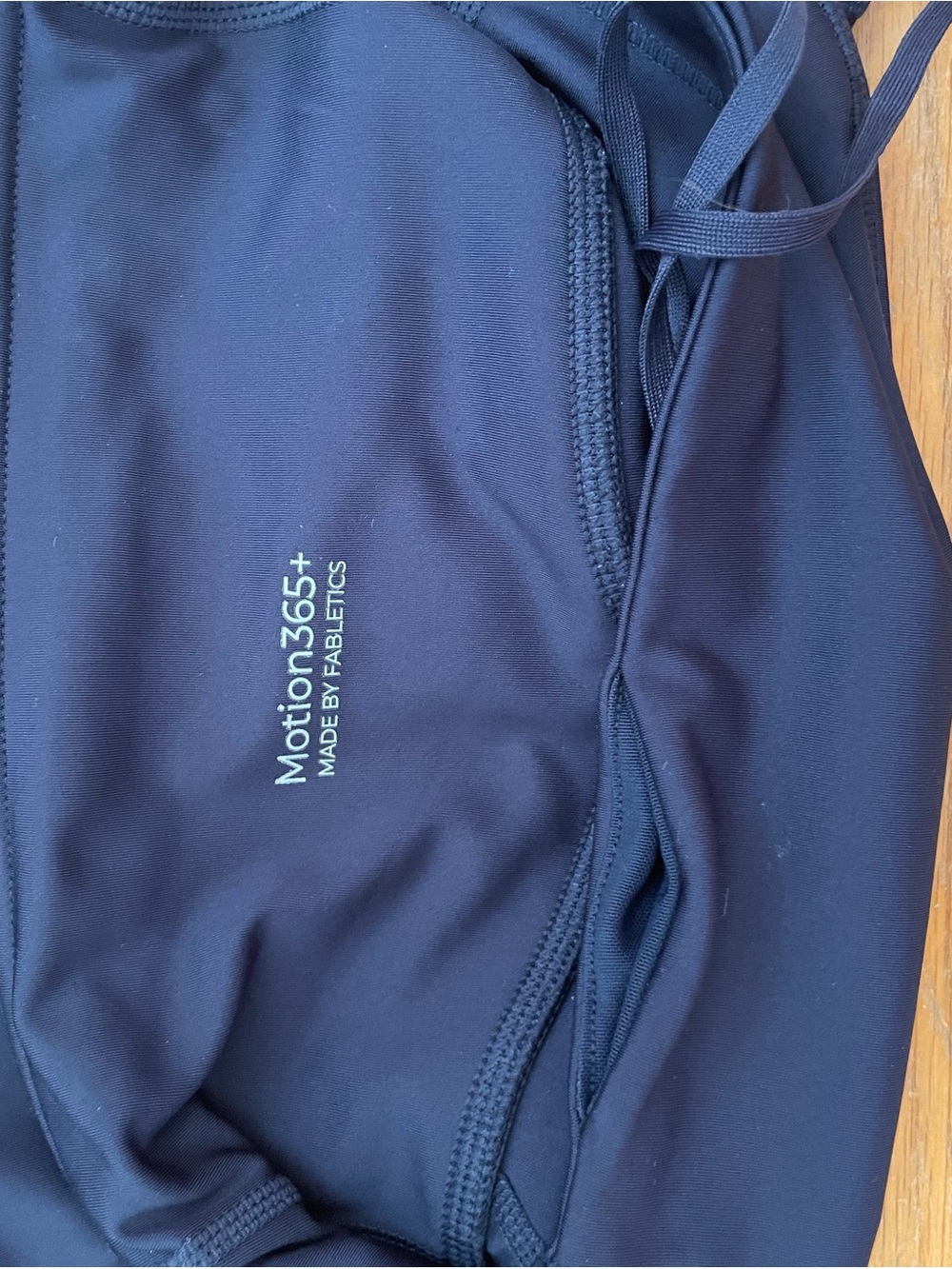 Fabletics Navy Bike Shorts with Light Blue Accent - Picture 3 of 3